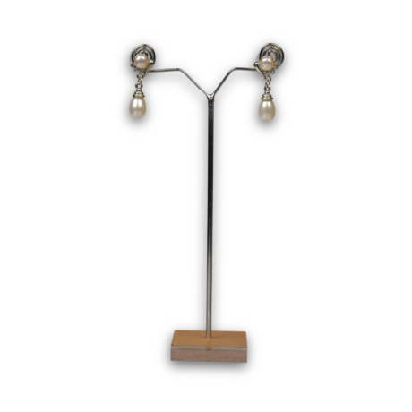 <div style="font-family: 'Georgia', serif; color: #333; line-height: 1;">   <h2 style="color: #b88e56; font-size: 0.8em; letter-spacing: 2px;  margin-bottom: 15px;">Moonlit Pearl Drops</h2></div>