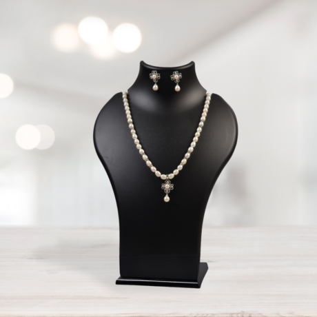 <div style="font-family: 'Georgia', serif; color: #333; line-height: 1;">   <h2 style="color: #b88e56; font-size: 0.8em; letter-spacing: 2px;  margin-bottom: 15px;">The Silver Bloom Pearl Set</h2></div>