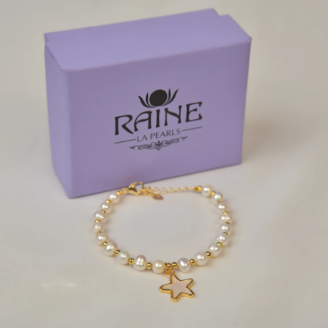 <div style="font-family: 'Georgia', serif; color: #333; line-height: 1;">   <h2 style="color: #b88e56; font-size: 0.8em; letter-spacing: 2px;  margin-bottom: 15px;">The Starlight Pearl Bracelet</h2></div>