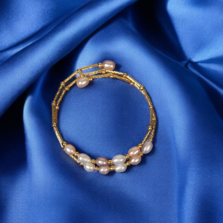 <div style="font-family: 'Georgia', serif; color: #333; line-height: 1;">   <h2 style="color: #b88e56; font-size: 0.8em; letter-spacing: 2px;  margin-bottom: 15px;">Sleek Freshwater Pearl Bangle</h2></div>